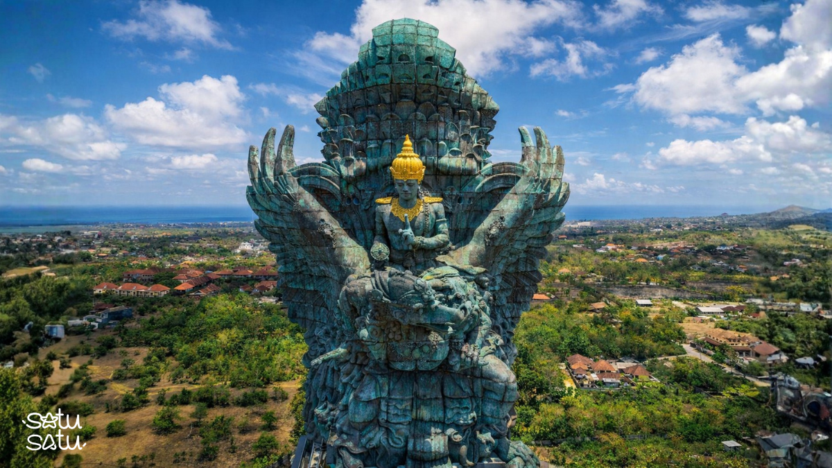 Garuda Wisnu Kencana (GWK) statue in Bali, depicting the Hindu god Vishnu riding Garuda with panoramic island views in the background.