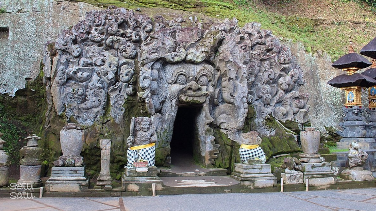 Goa Gajah Temple in Bali featuring the historic Elephant Cave entrance with intricate stone carvings and traditional Balinese architecture