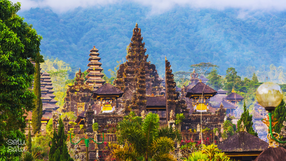 Pura Besakih temple complex in Bali with traditional Balinese architecture set against Mount Agung