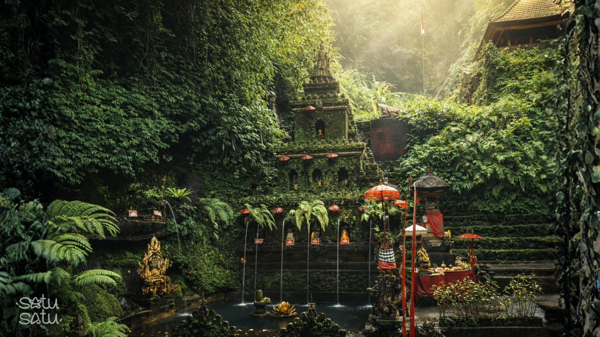 Pura Taman Pecampuhan Sala in Bali, a sacred melukat purification temple surrounded by lush jungle and holy spring water pools.
